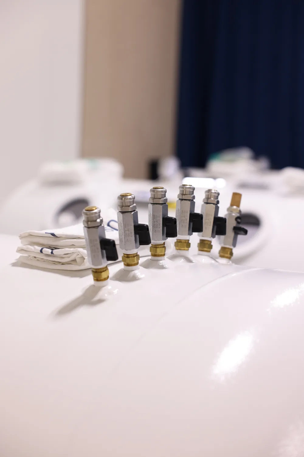 Close-up of oxygen and air fittings on an RX-O2 hyperbaric chamber